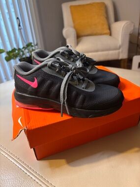 Nike Kids Black and Gray Sneakers with Pink Accent